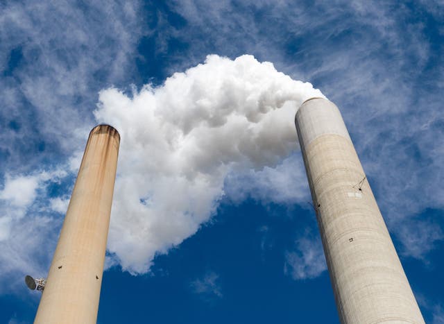<p>The smoke stacks at American Electric Power’s Mountaineer coal power plant in New Haven, West Virginia. US emissions increased last year - but at a slower rate than in 2021 and did not return to pre-pandemic levels</p>