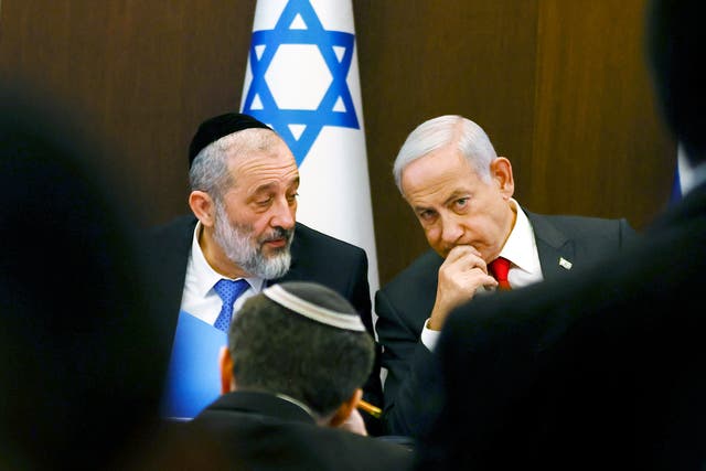<p>Israeli Prime Minister Benjamin Netanyahu, right, speaks with Aryeh Deri </p>