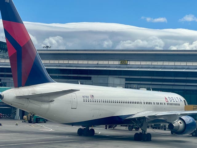 <p>Tax dodge: Delta Airlines plane at Dublin airport, where Air Passenger Duty does not apply</p>