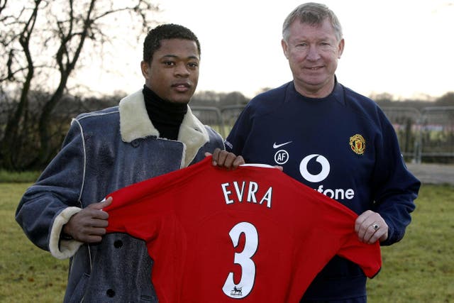 Patrice Evra signed for Manchester United on this day in 2006 (Phil Noble/PA)