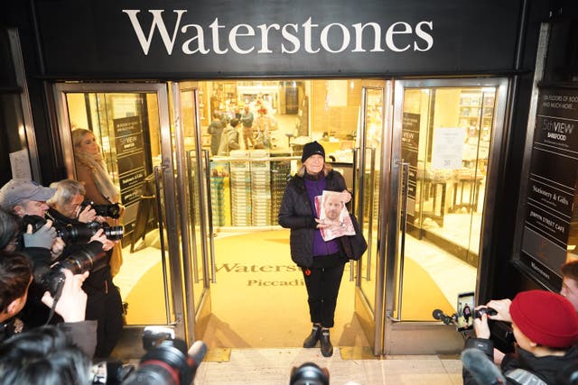 Caroline Lennon was the first customer to purchase a copy of the Duke of Sussex’s memoir Spare at Waterstones in London’s Piccadilly (James Manning/PA)