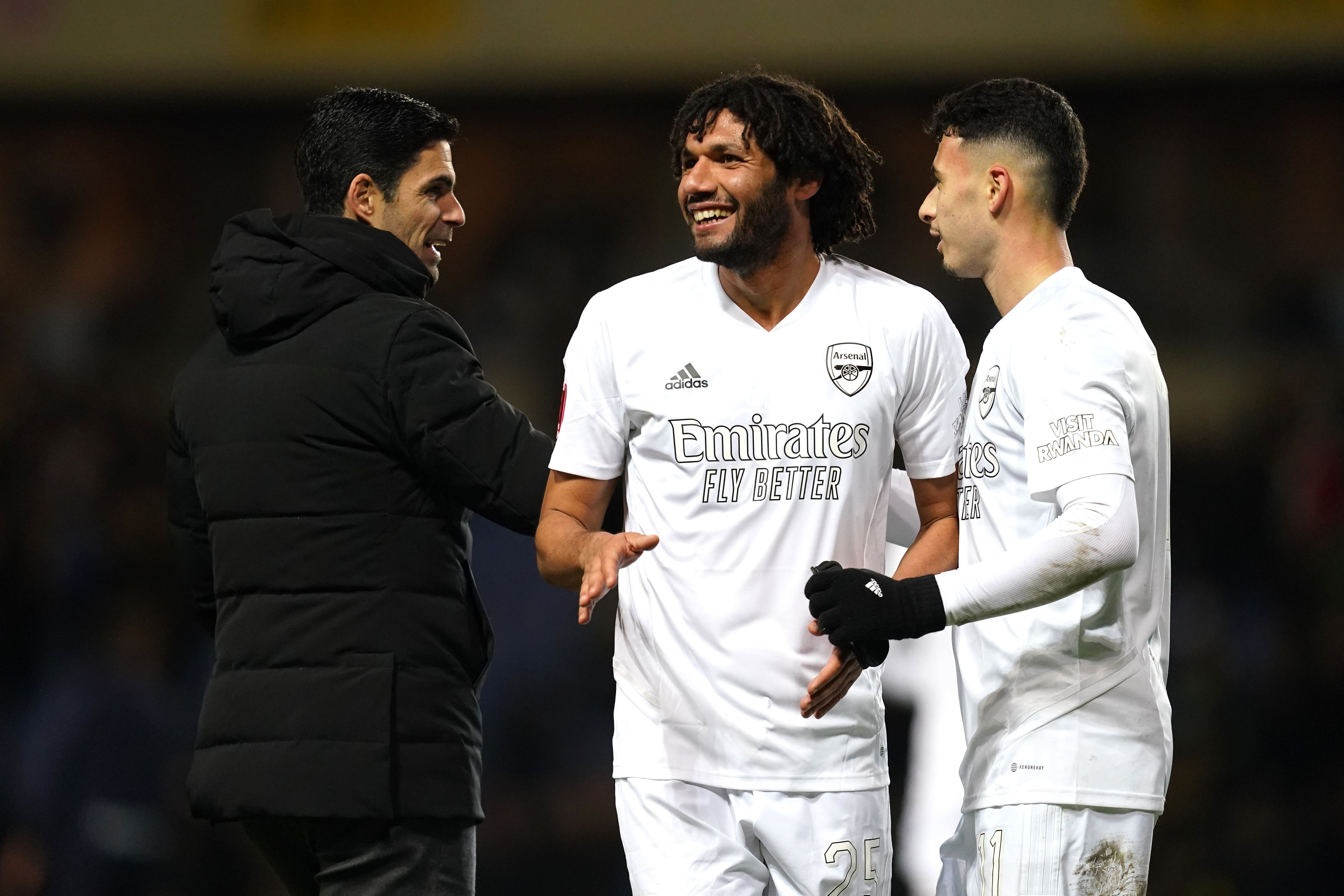 Mohamed Elneny, centre, scored for Arsenal as they beat Oxford in the FA Cup (Nick Potts/PA)