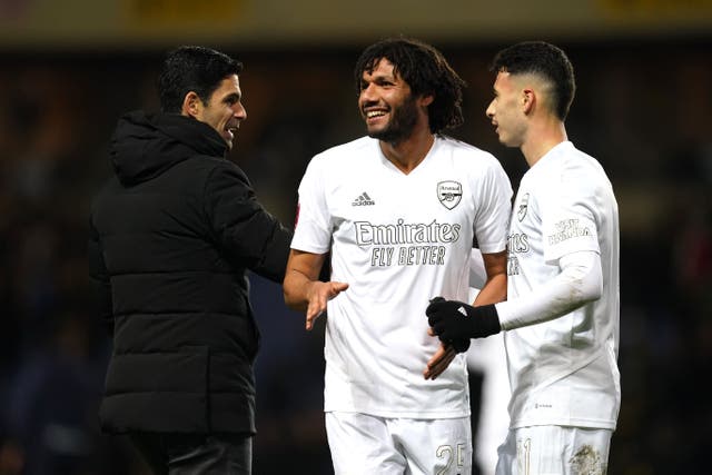 Mohamed Elneny, centre, scored for Arsenal as they beat Oxford in the FA Cup (Nick Potts/PA)