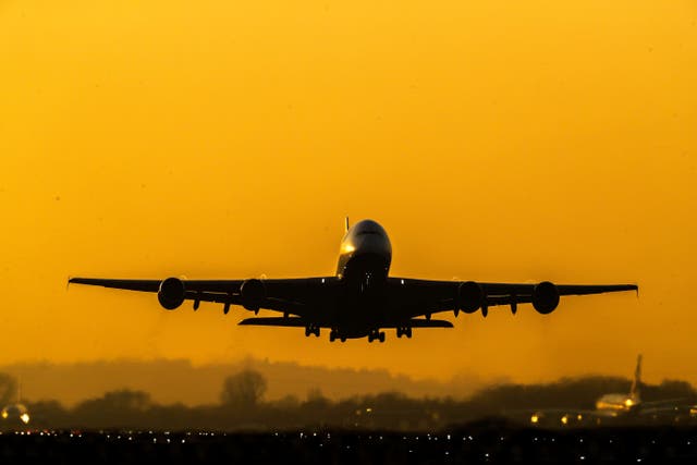 Concerns about Covid-19, budget constraints and fears about flight disruption are the most common barriers to air travel, new research suggests (Steve Parsons/PA)