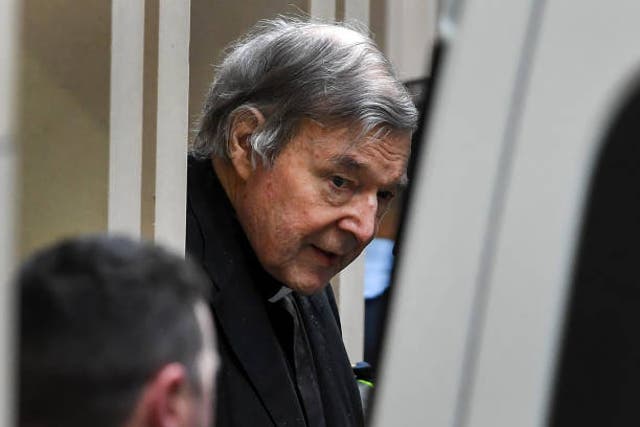 <p>Australian Cardinal George Pell escorted from the Supreme Court of Victoria in Melbourne in 2019</p>