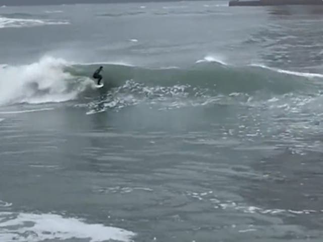 <p>Surfers spotted near Golden Bridge as California witnesses high tides</p>