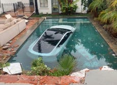 Boy, 4, and two adults rescued by good samaritans after Tesla crashes into California swimming pool