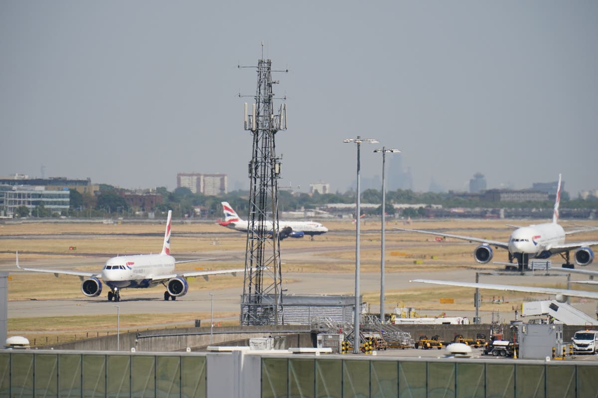 Heathrow Airport hit by mass flight cancellations as freezing fog sweeps UK