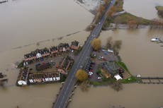 Aerial images show UK town almost cut off by flood water 