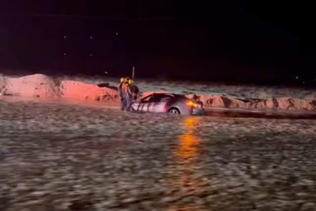 <p>A motorist trapped in the vehicle as California’s famous desert resort city Palm Springs was hit by heavy winter storm</p>