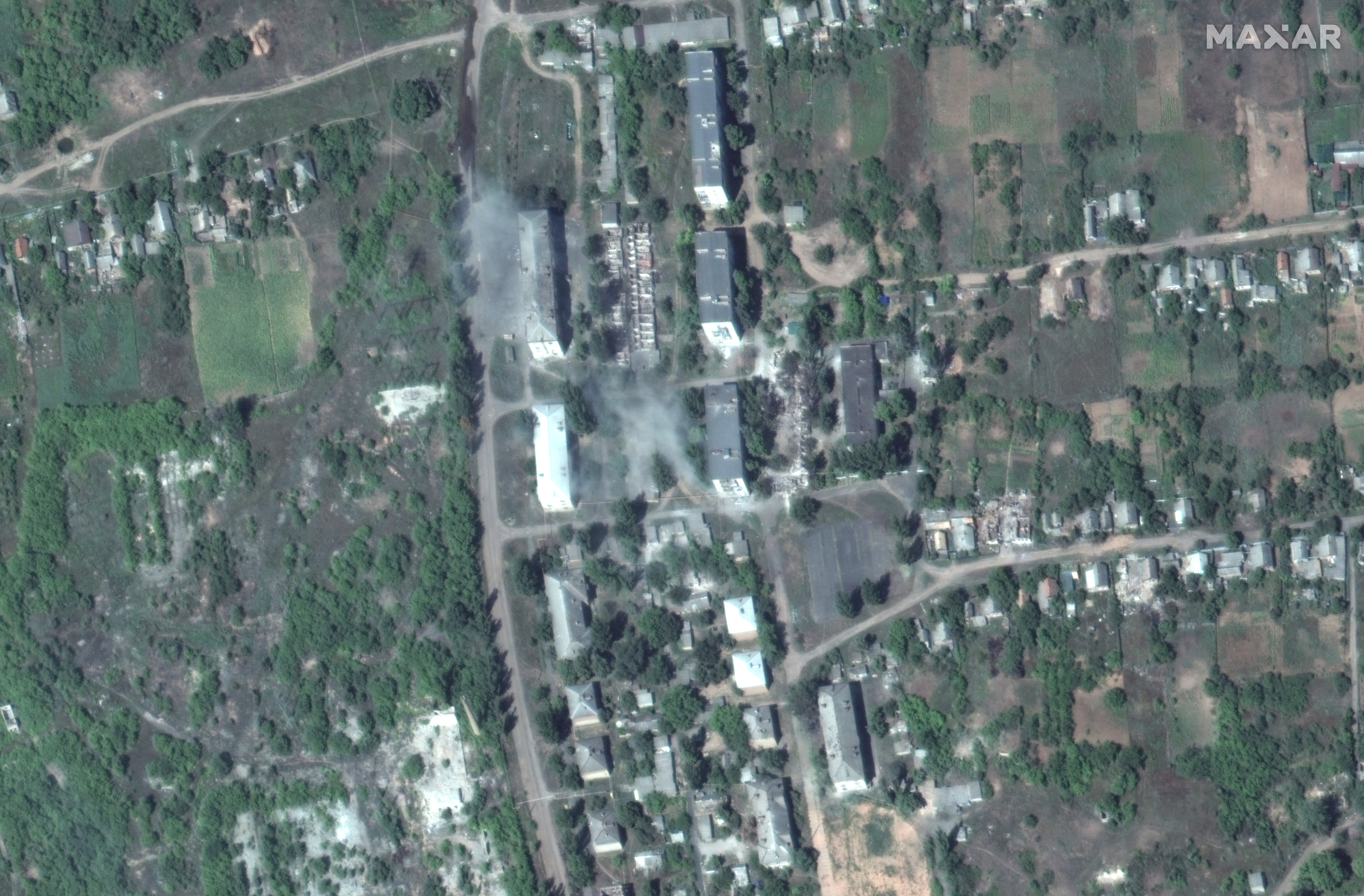 Apartment buildings and homes seen in Soledar at the start of the siege in Ukraine in August last year