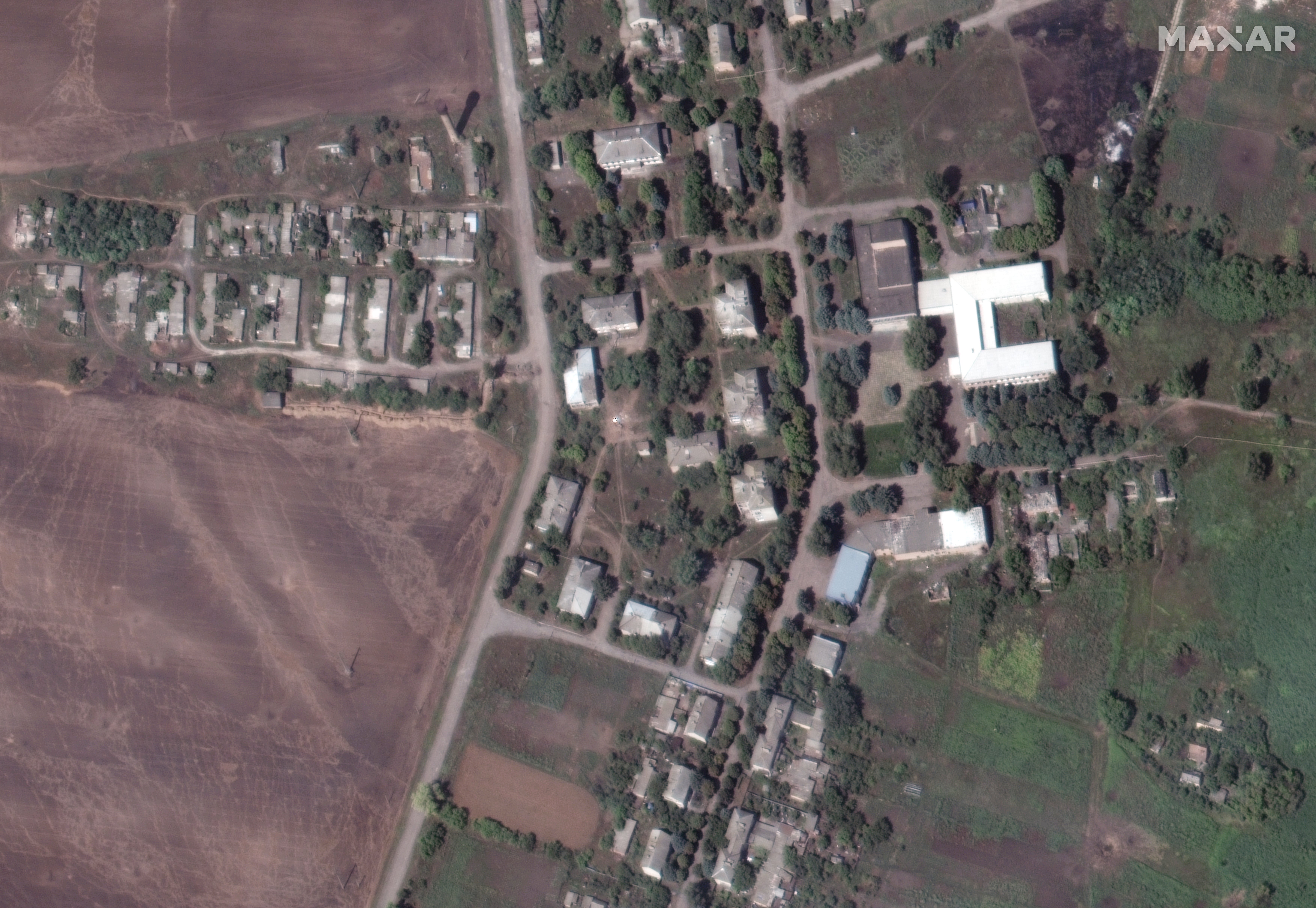 School and buildings seen in south Soledar near Bakhmut on 1 August last year before the region came under heavy attacks