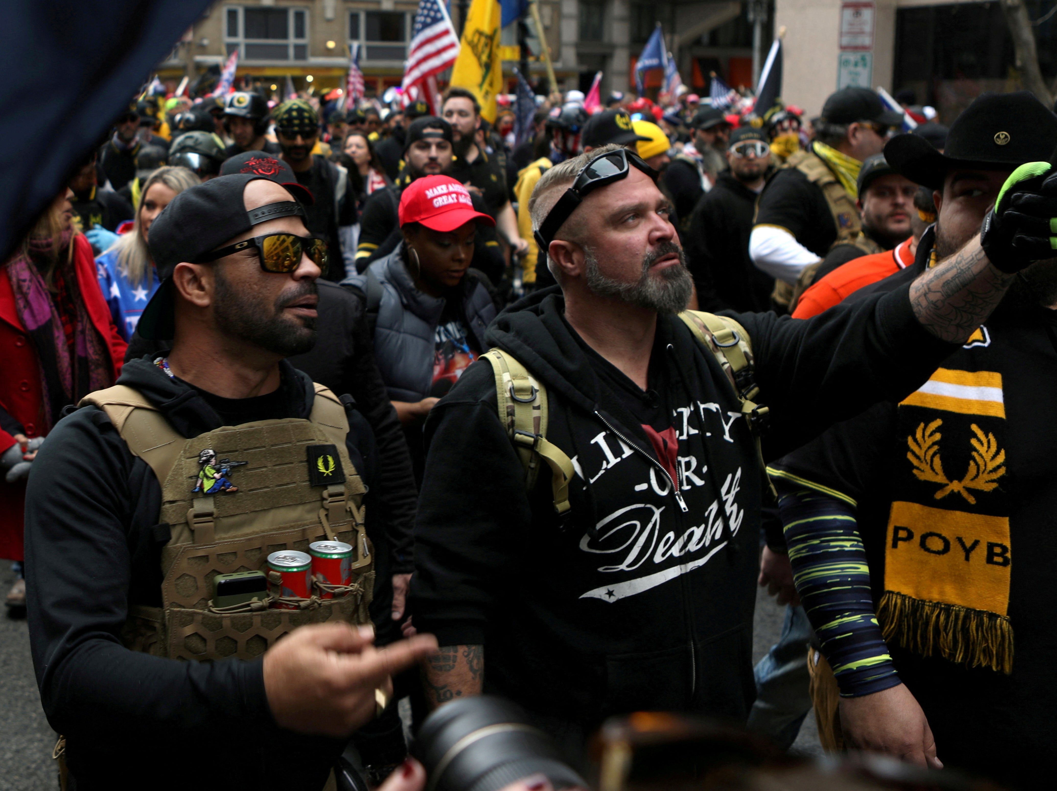 Proud Boys members Enrique Tarrio and Joe Biggs march during a December 2020 protest in Washington DC