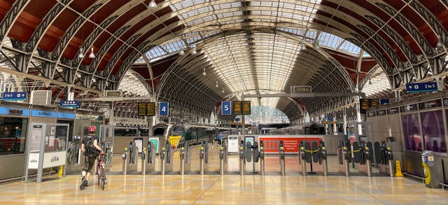 <p>A quiet Paddington station during last year’s strikes</p>