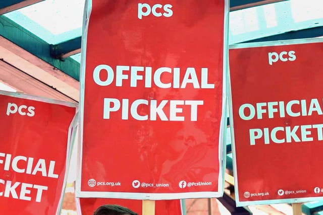 Members of the Public and Commercial Services union on the picket line (Nick Warren/PA)