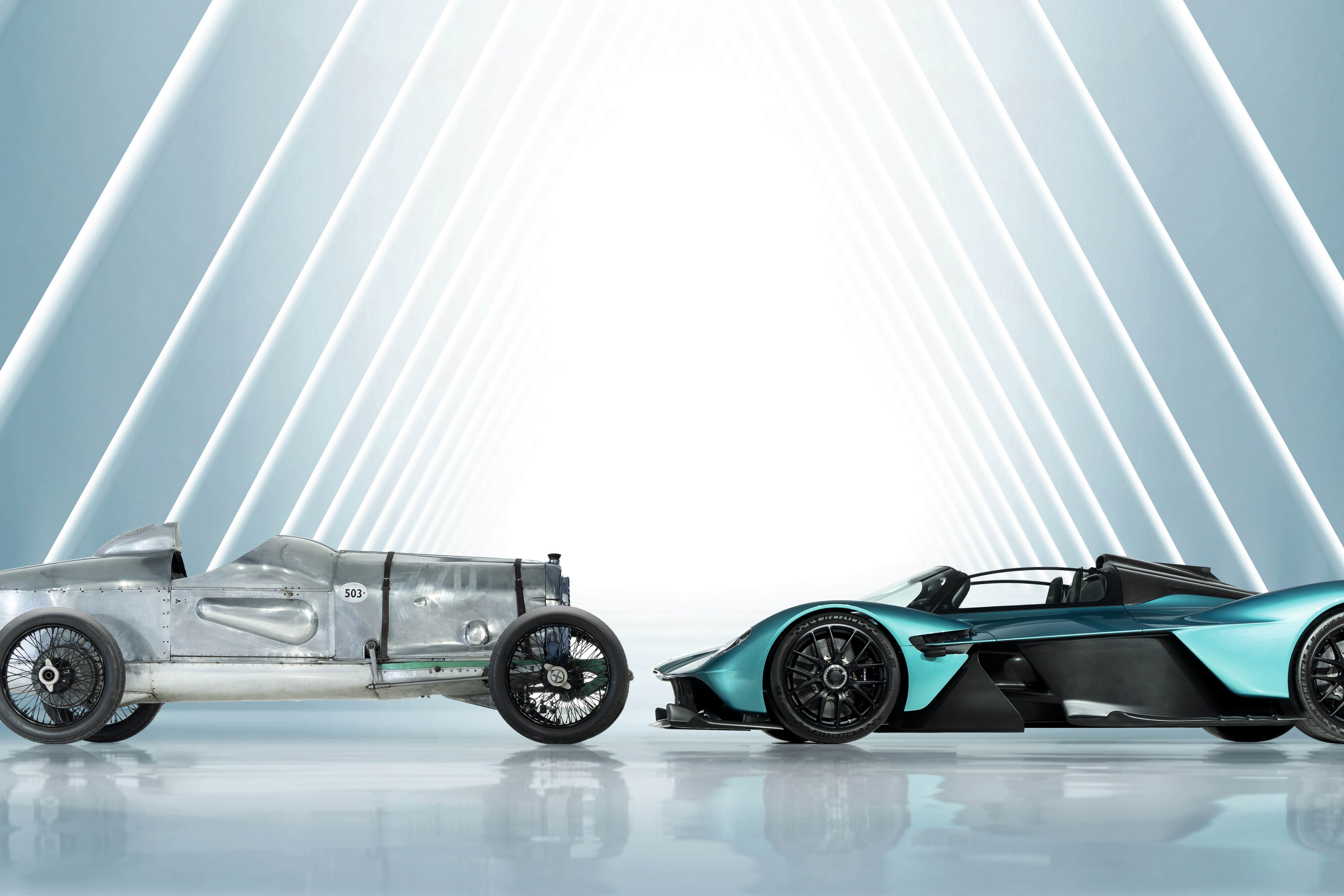 Car maker Aston Martin has brought together two of its most innovative models to mark its 110th anniversary (Aston Martin/PA)