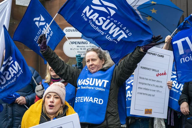 Members of NASUWT are campaigning for better pay (Jane Barlow/PA)