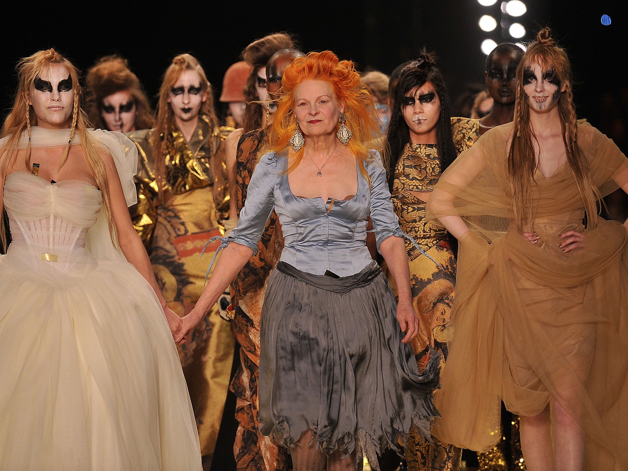 Westwood and models walk the runway during her autumn/winter show in March 2011