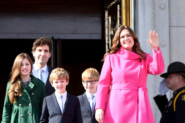 <p>Arkansas governor-elect Sarah Huckabee Sanders is introduced with husband Brian, and children Scarlett, George, and Huck</p>