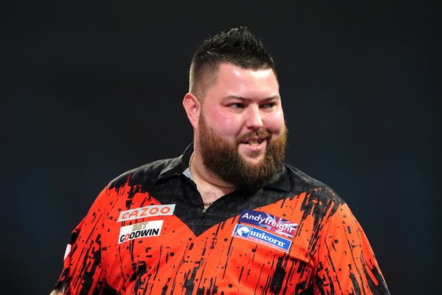 Michael Smith was in action for the first time as World Champion in Bahrain (Zac Goodwin/PA)