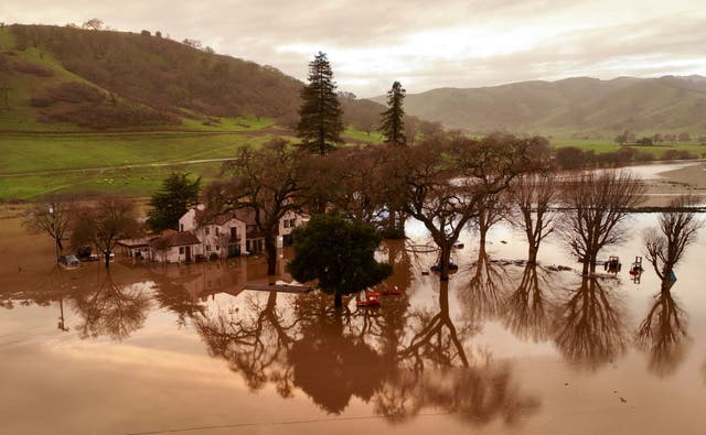 <p>A flooded house is seen partially underwater in Gilroy, California, on January 09, 2023</p>