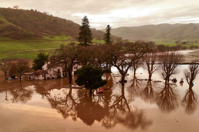 <p>A flooded house is seen partially underwater in Gilroy, California, on January 09, 2023</p>