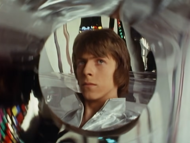 <p>Silver surfer: Bowie in the original video for ‘Space Oddity’ </p>