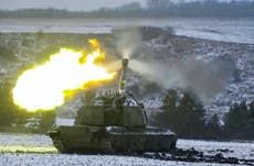 Ukraine news – live: Putin’s forces claim control of key town Soledar as Kyiv says troops holding on