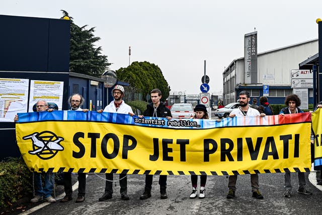 <p>Climate activists in Italy demand a ban on private jets</p>