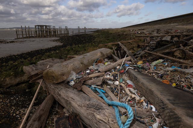 <p>Plastics and other detritus line the shore of the Thames estuary on Friday at Cliffe, north Kent</p>