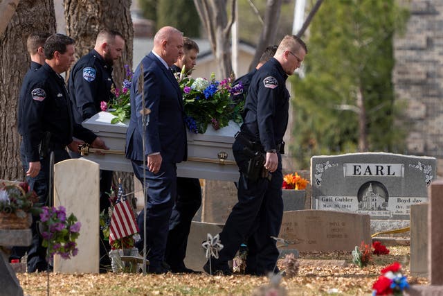 <p>Pallbearers carry a casket to the graveside service for the Haight and Earl families in La Verkin, Utah</p>