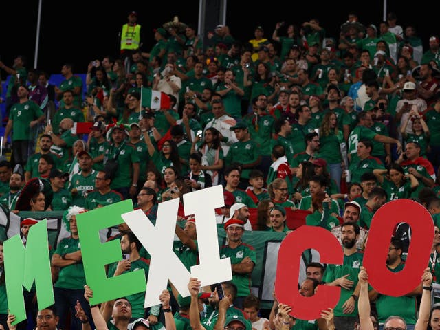 <p>Mexico fans ahead of their match with Poland at the World Cup</p>