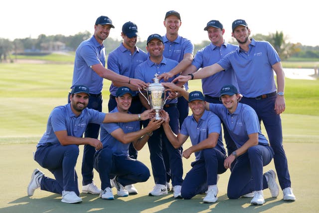 Continental Europe Captain Francesco Molinari holds the trophy after his side’s Hero Cup win over Great Britain and Ireland (Kamran Jebreili/AP)