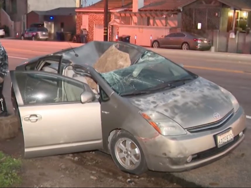 A man’s car was crushed by a falling boulder in Malibu, California