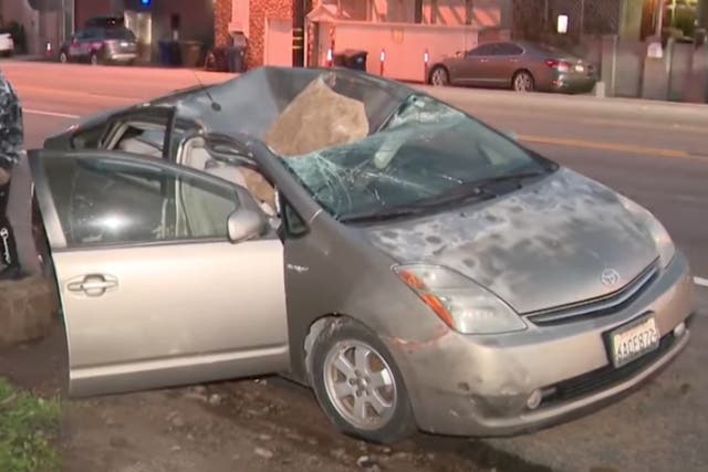 <p>A man’s car was crushed by a falling boulder in Malibu, California</p>