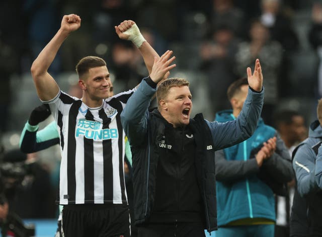 <p>Newcastle United’s Sven Botman and manager Eddie Howe celebrate</p>