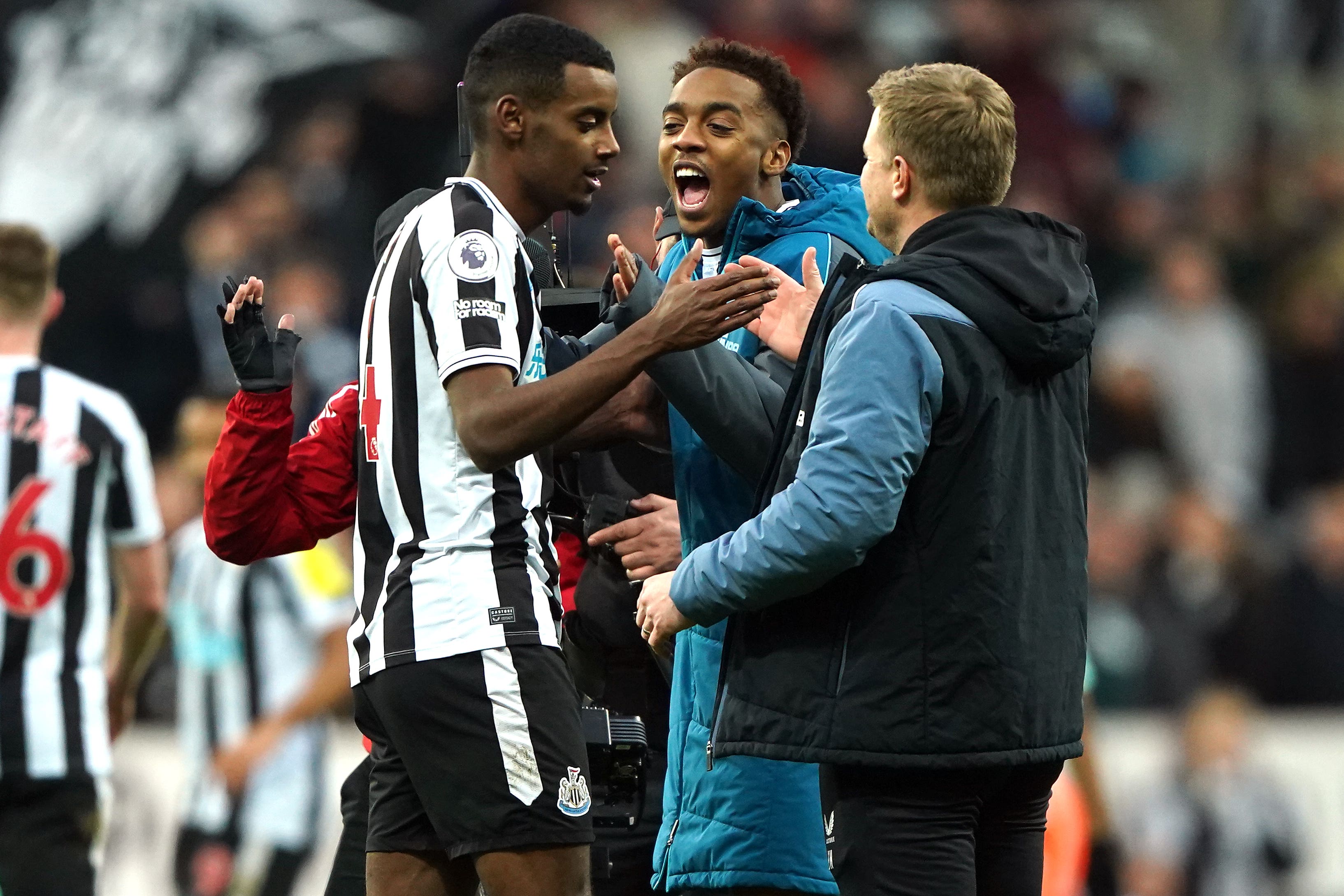 Newcastle striker Alexander Isak celebrates with head coach Eddie Howe after the victory over Fulham (Owen Humphreys/PA)