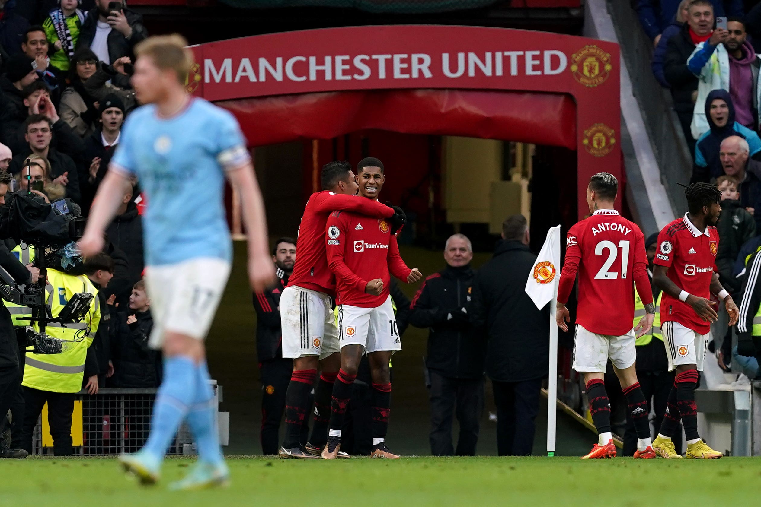 Marcus Rashford celebrates his derby winner (Martin Rickett/PA)