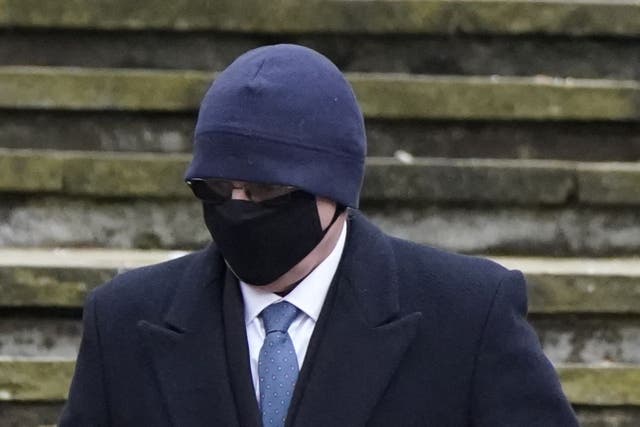 Michael Lawrence arrives at Winchester Crown Court, Hampshire, where he is facing charges over the death of 15-year-old Emily Lewis (Andrew Matthews/PA)