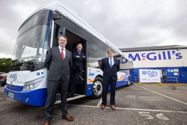 Sandy Easdale, McGill’s CEO Ralph Roberts, and James Easdale (McGills/PA)
