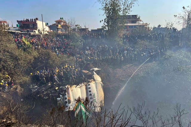 The wreckage of the passenger plane (Krishna Mani Baral/AP)