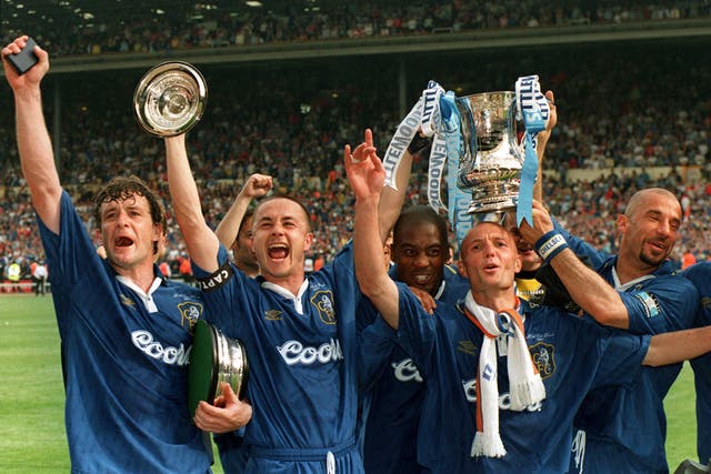 Mark Hughes (left) and Gianluca Vialli (right) celebrate winning the FA Cup (PA)