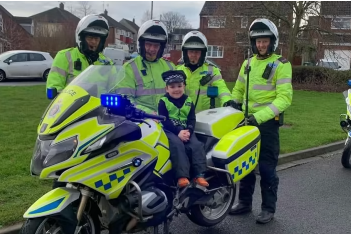 Boy, five, who lost father last year leads police on unique motorcycle ride