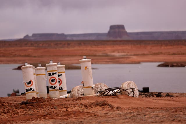 <p>Buoys sit on the beach at Lake Powell on March 28, 2022 in Page, Arizona. Severe drought continues to grip parts of the Western United States,</p>