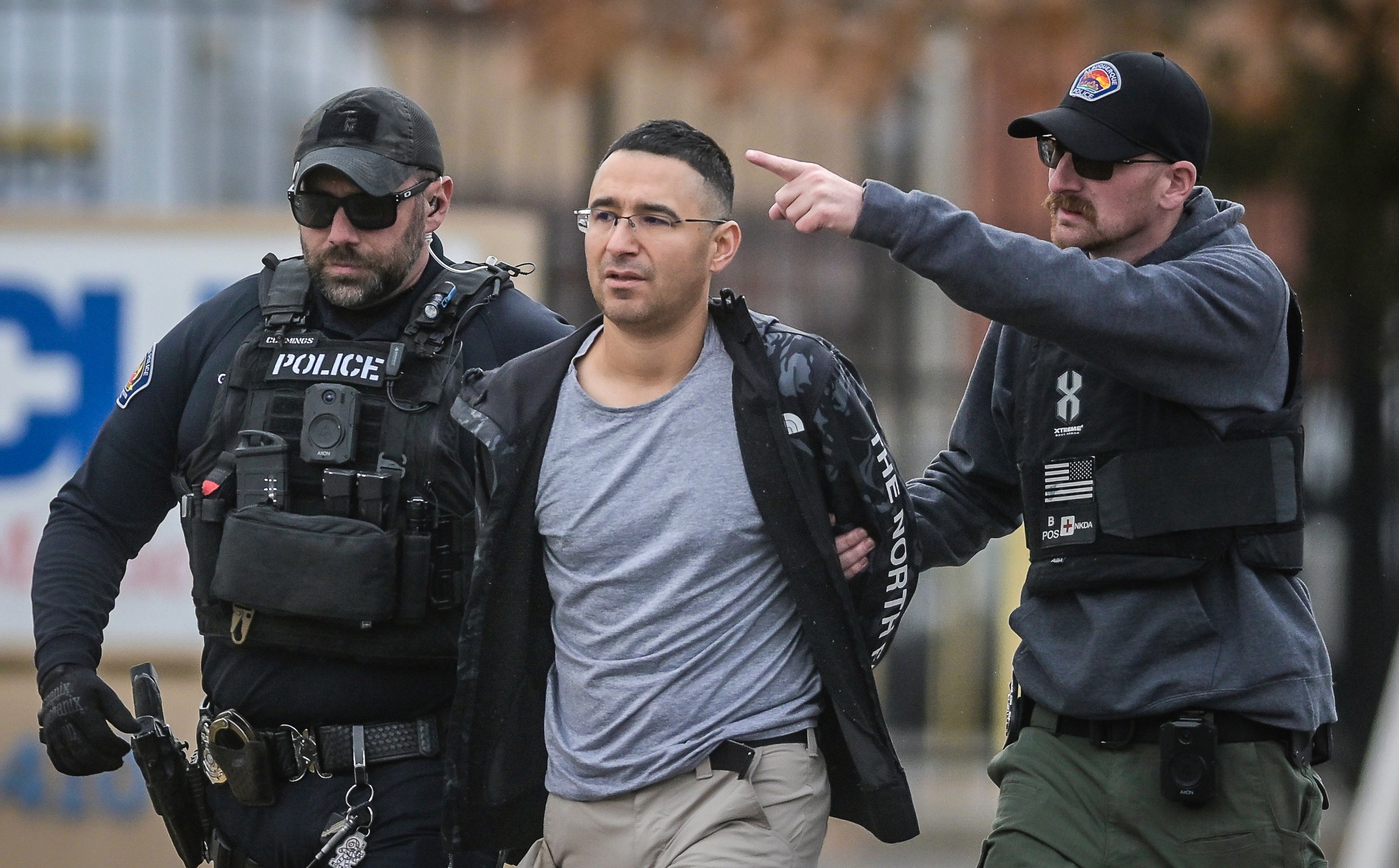 Solomon Peña being arrested on Monday by a APD SWAT team