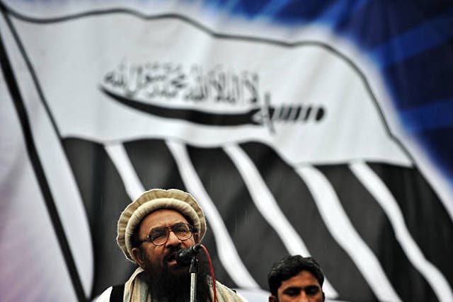 <p>File Abdul Rehman Makki, leader of Pakistan Jamaat-ud-Dawa, addresses rally in Islamabad </p>