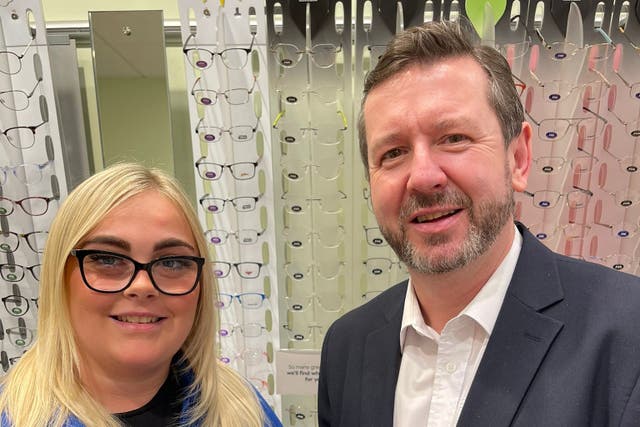 Carly Stewart with Specsavers optometrist director Neil Drain (Specsavers/PA)