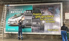 Green protestors ‘hijack’ Toyota billboards across Europe