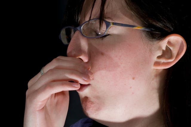 GPs have warned that coughs seem to be lasting longer this winter (PA)