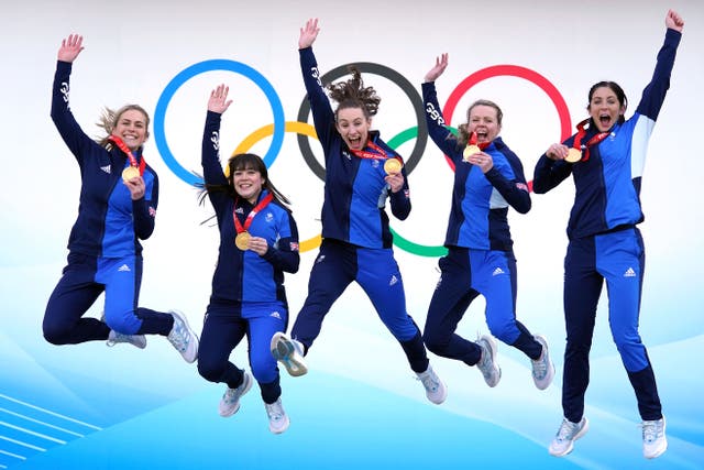 Great Britain’s Olympic gold medal-winning women’s curling team (PA)